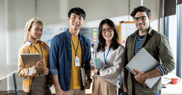 People smiling and making a good first impression